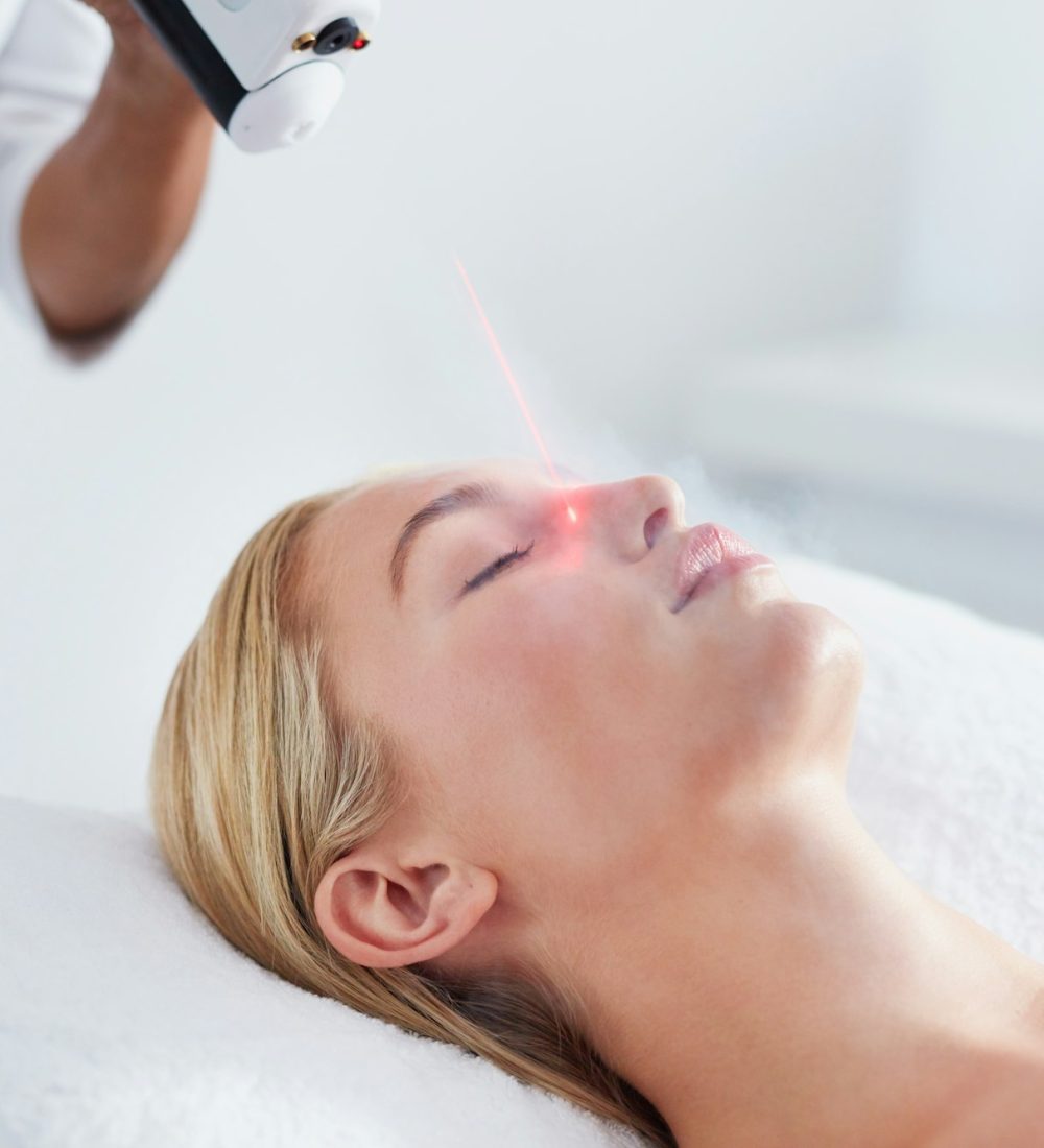 Woman undergoing local cryotherapy at spa